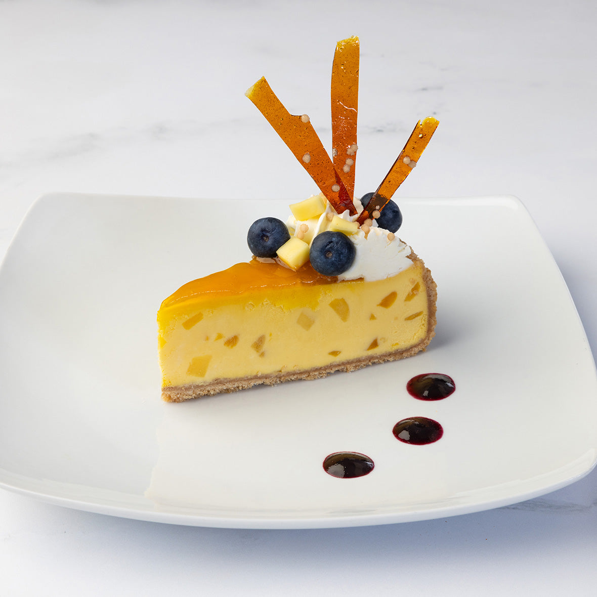 Mango Passion Fruit Cheesecake